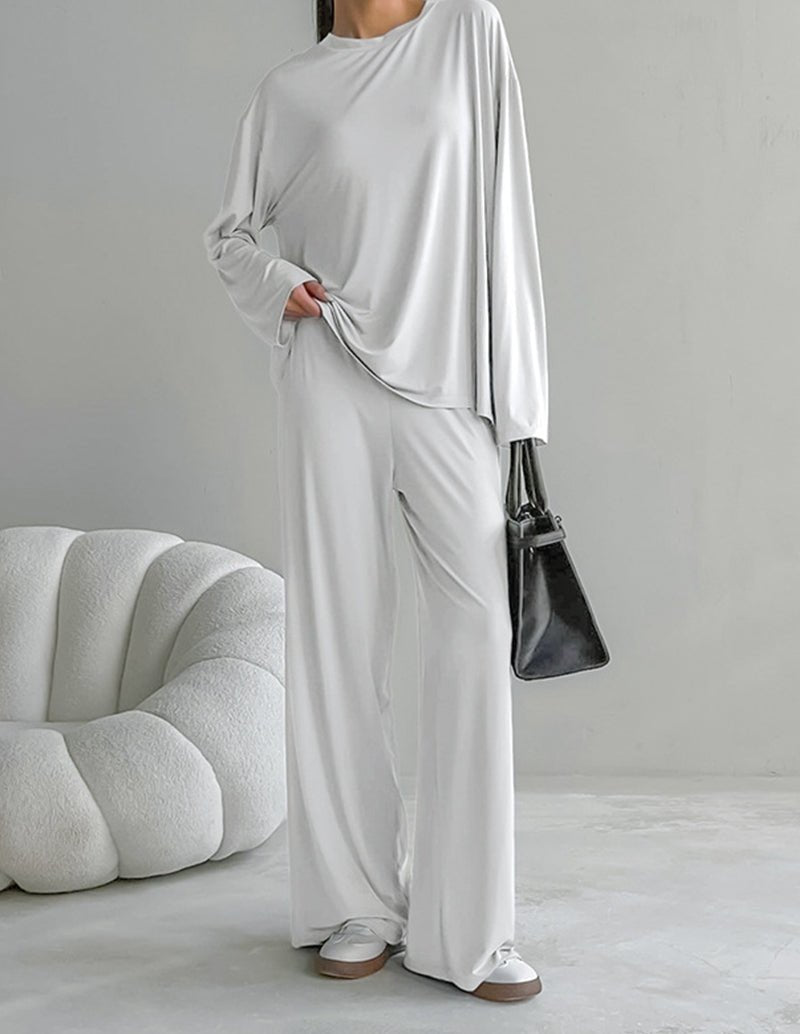 White long-sleeve lounge set with wide-leg pants and crew neck, draped fit