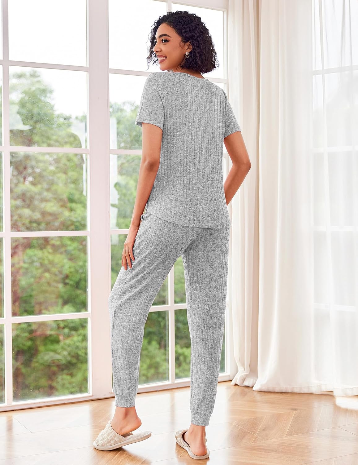 Rib knit lounge set in light gray: short-sleeve top and jogger pants from the back