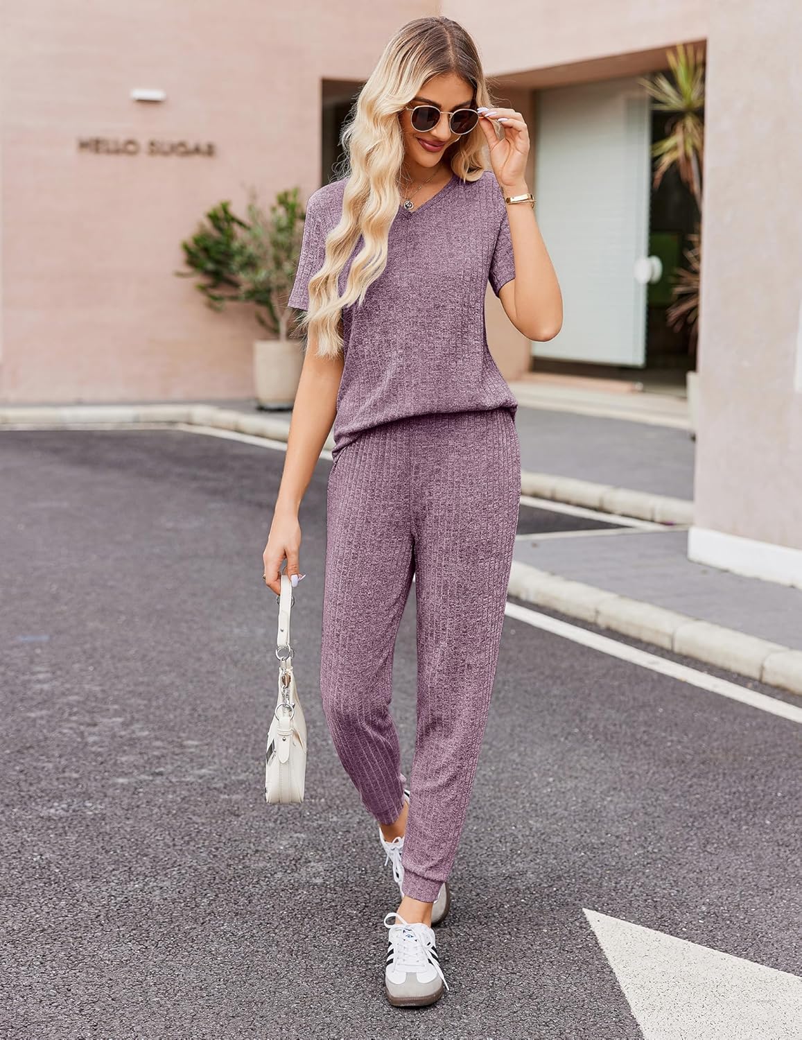Rib knit lounge set: purple short-sleeve top and jogger pants with cuffed hems