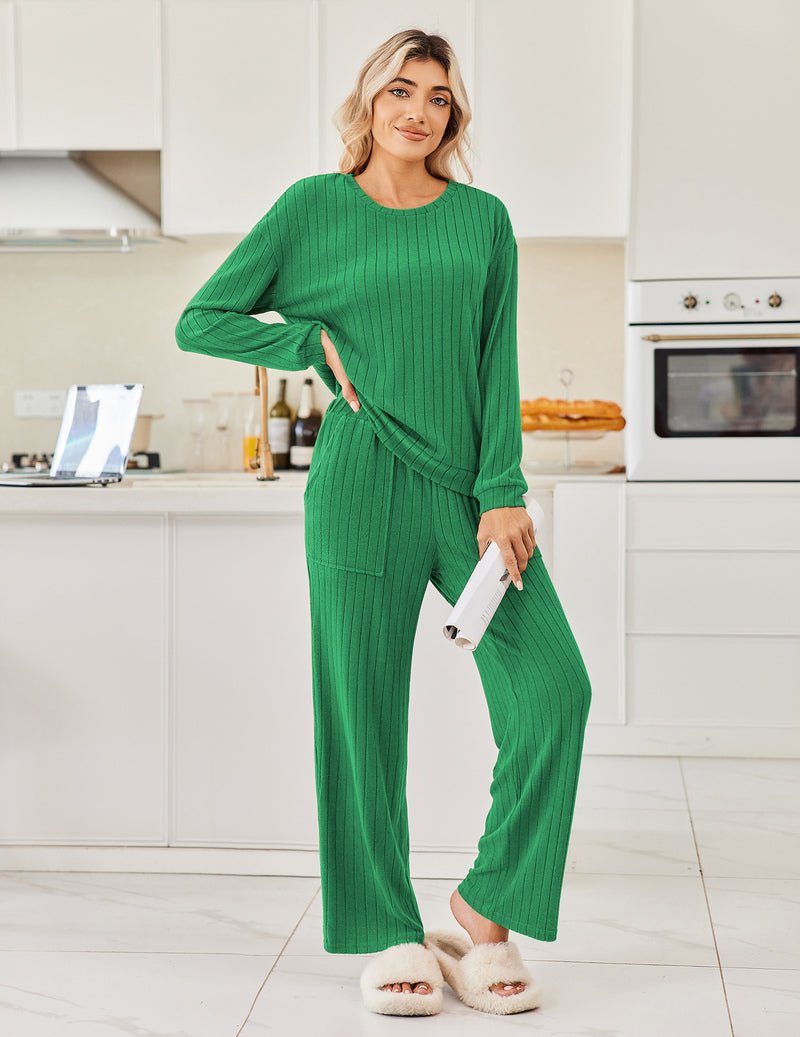 Green ribbed knit pajama set: long-sleeve top with pants, wide-leg fit.
