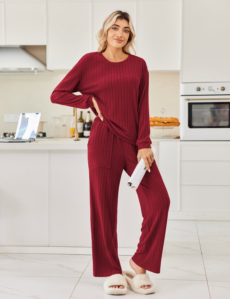 Wine red ribbed knit pajama set: long-sleeve top and wide-leg pants.