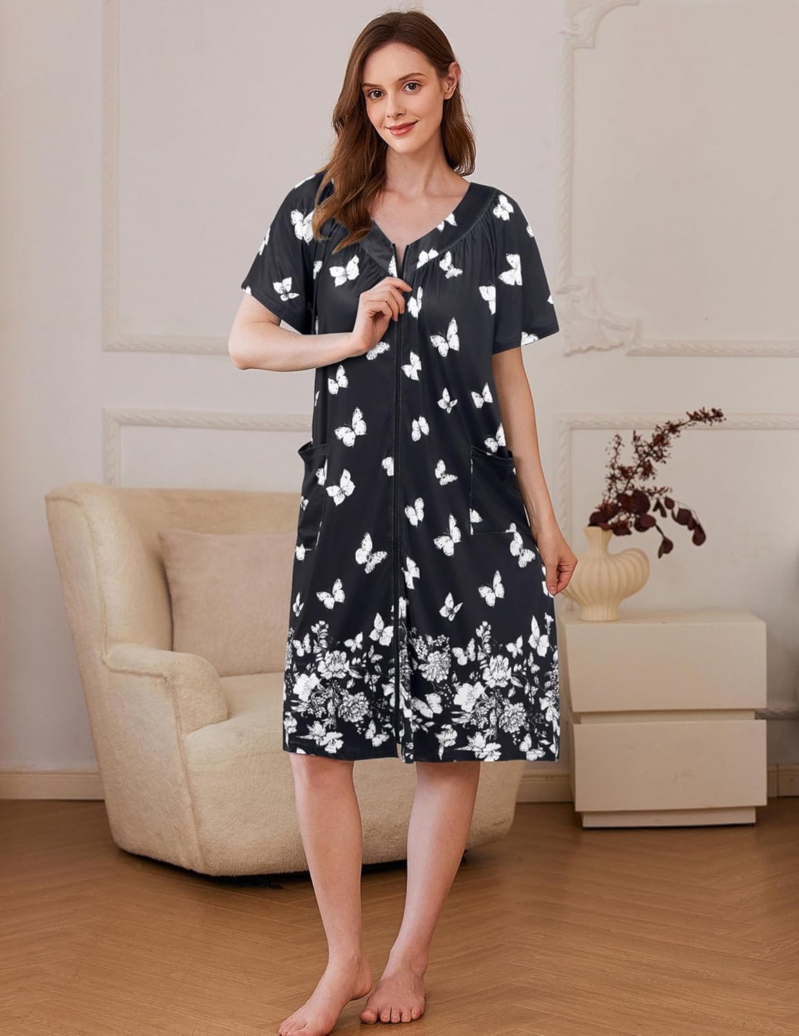 Front-zip housecoat robe, black with white butterfly and flower print, short sleeves