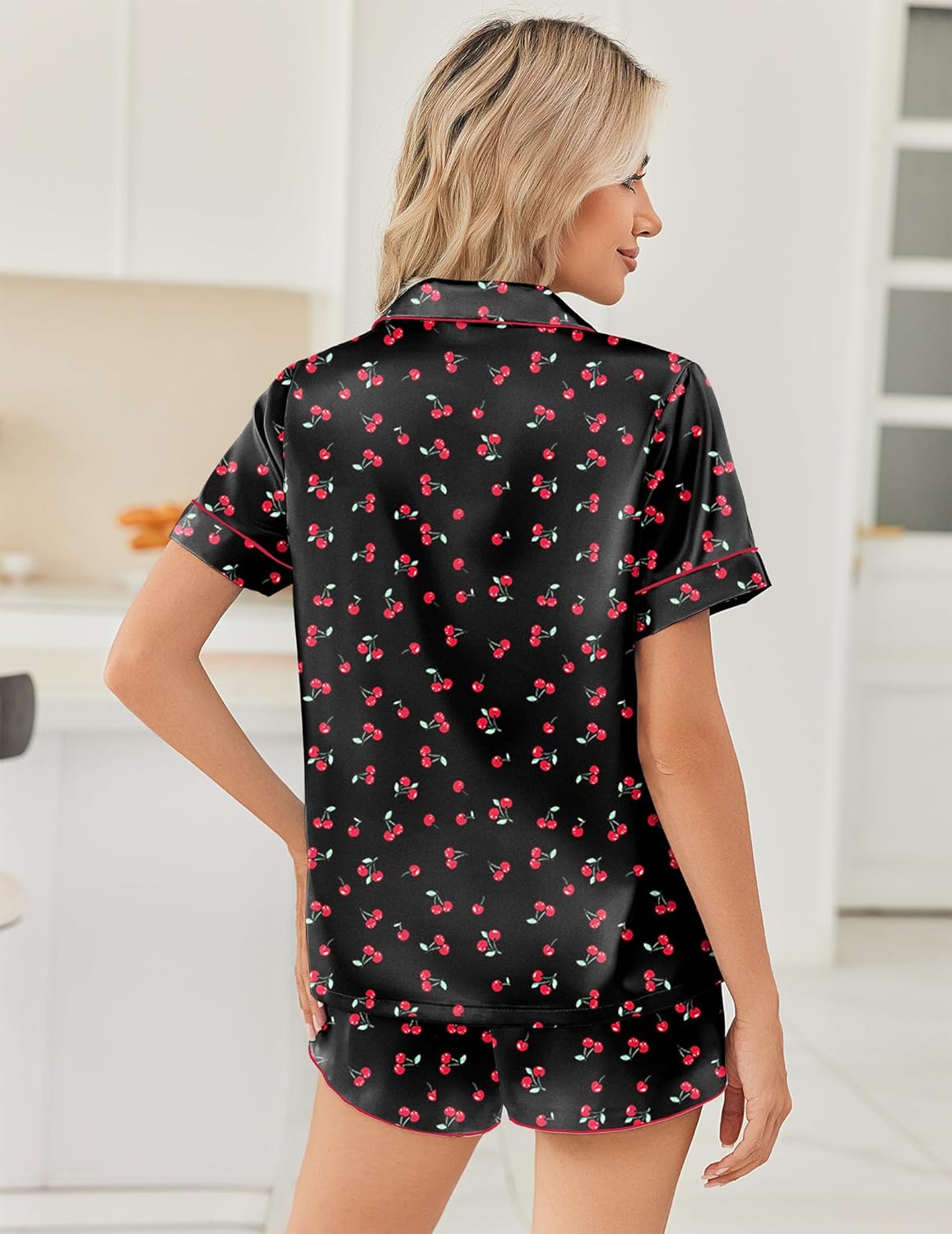 Black cherry-print satin pajama set, short-sleeve button-up and shorts, back view