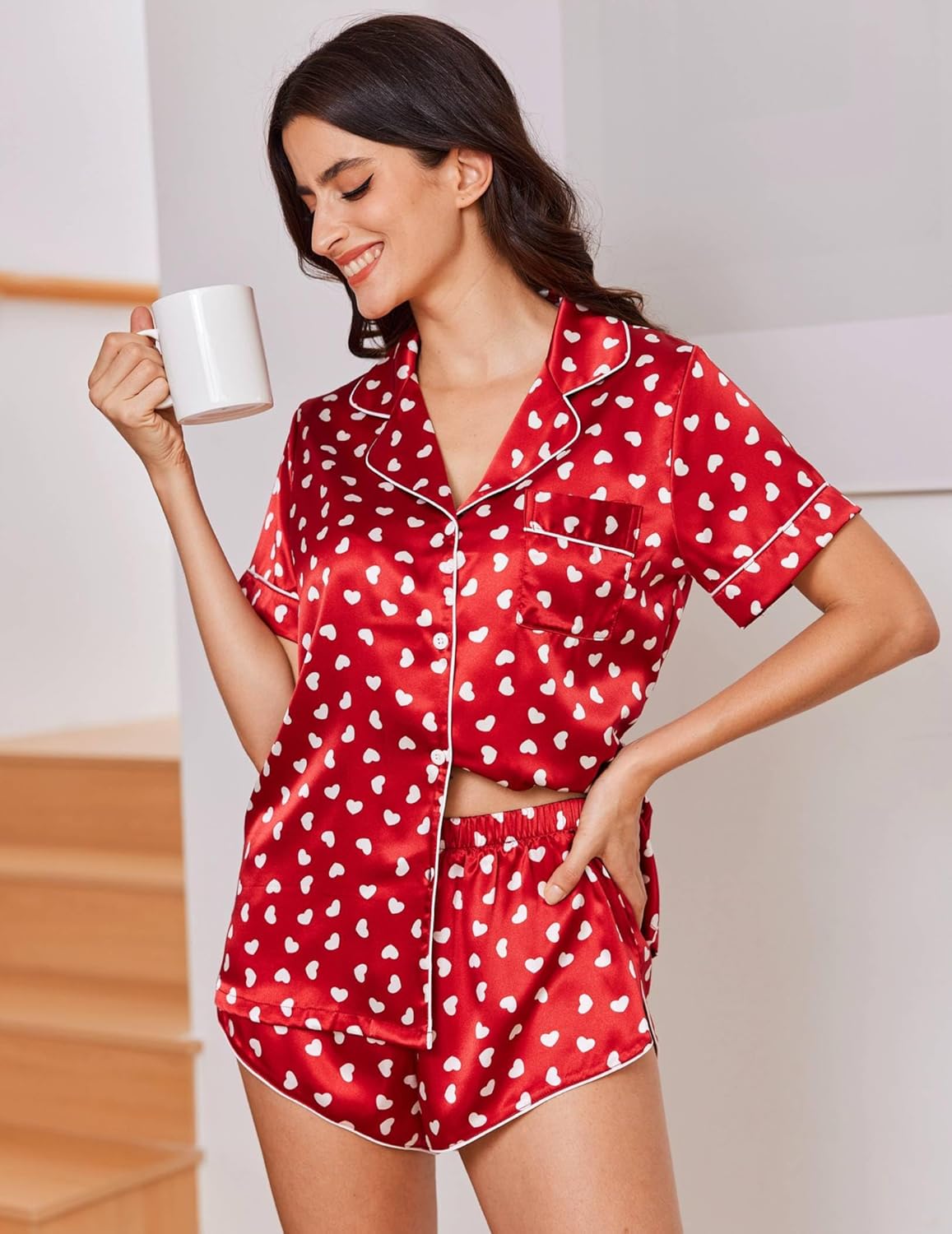 Red heart print satin pajama set with button-down shirt and matching shorts