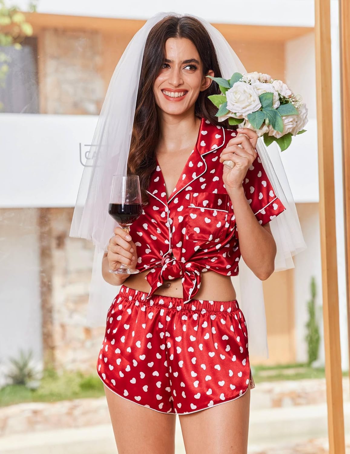 Red heart print satin pajama set with button-up shirt and drawstring-tie shorts