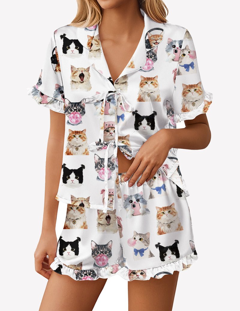 White satin pajama short set with cat face print and front bow tie, ruffled hem