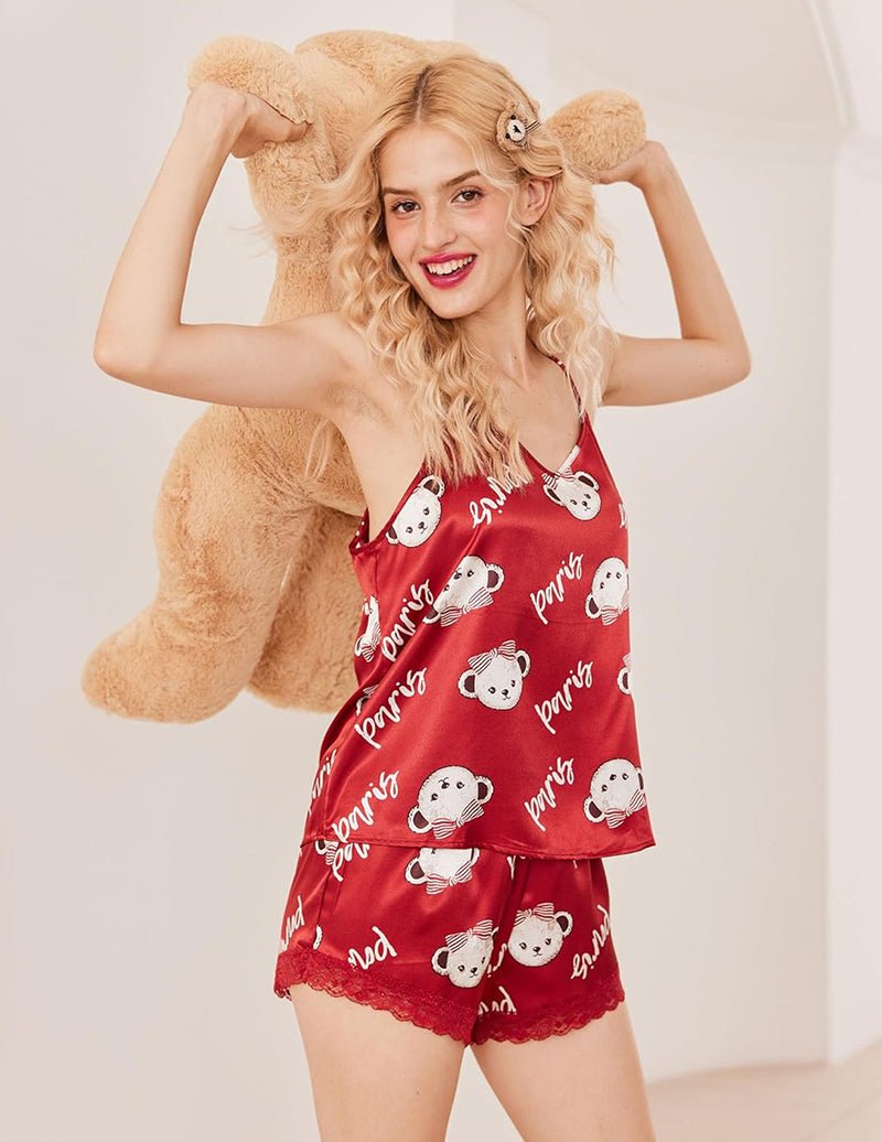 Red satin sleep set with spaghetti-strap cami and lace-edged leopard-bear shorts