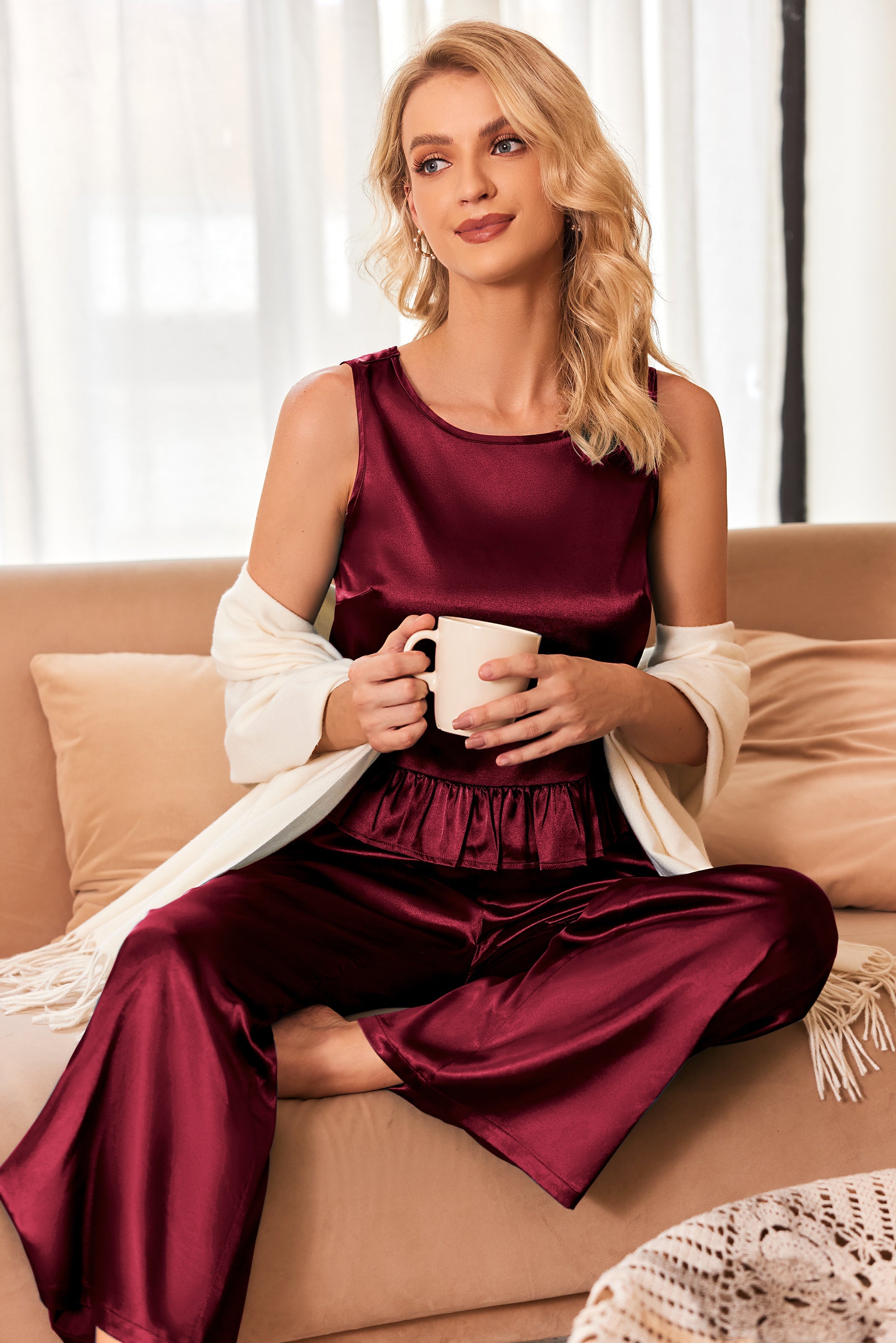 Ruffle satin pajama set in wine red, sleeveless top with ruffle hem and matching pants