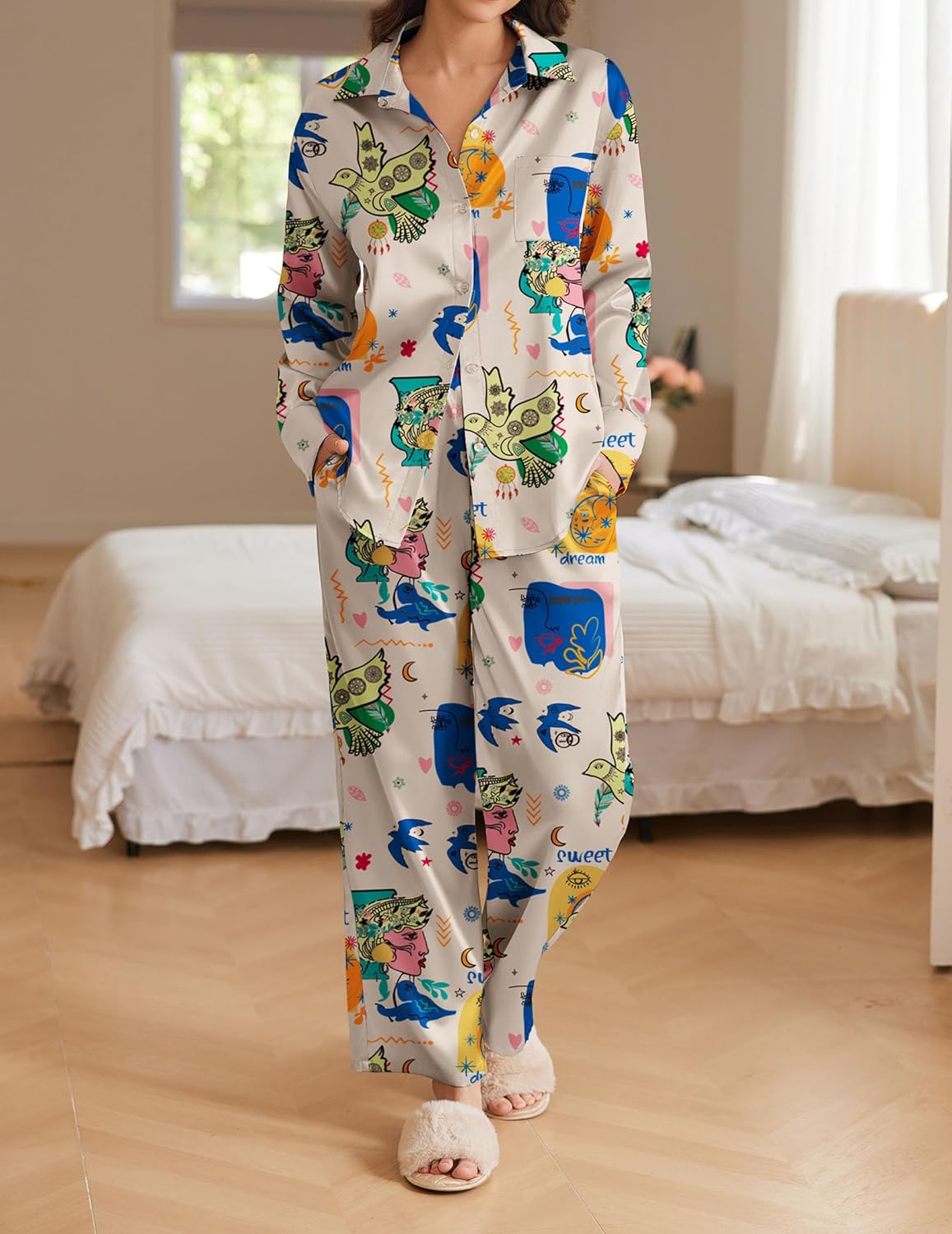 Pink printed satin pajama set with long-sleeve button shirt and matching pants