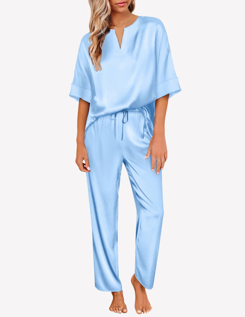 Light blue satin V-neck pajama set with short sleeves and drawstring wide-leg pants