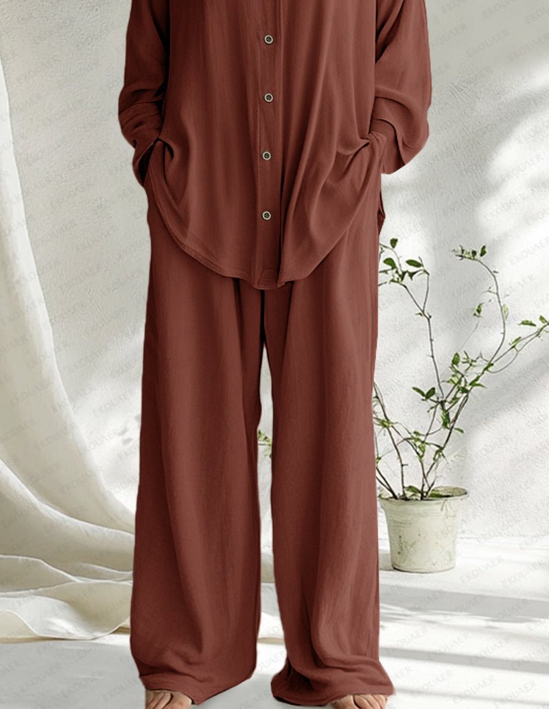 Brown cotton pajama pants with relaxed wide legs and matching button-front top