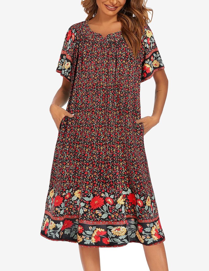 Floral house dress, dark base with small red flower print, short sleeves, tiered hem