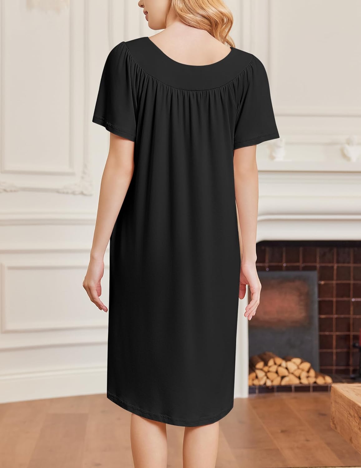Black short-sleeve house dress with gathered neckline and loose A-line fit