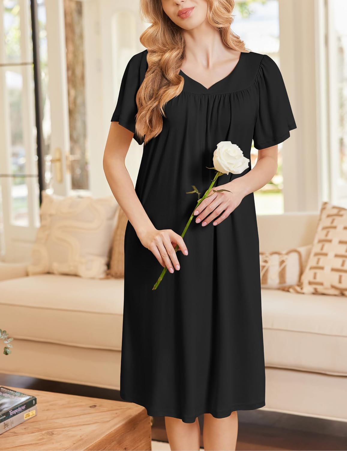 Black short sleeve house dress with V neckline, gathered yoke and midi length