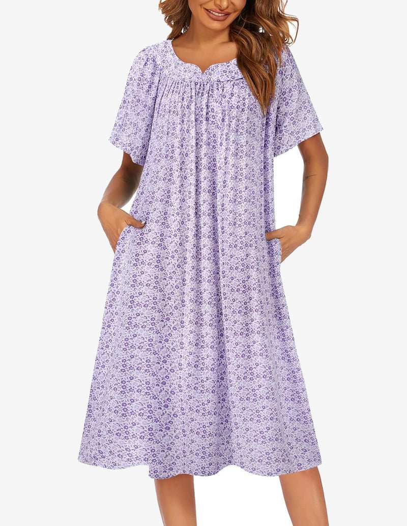 Purple short-sleeve house dress with pockets, allover floral print and gathered neckline