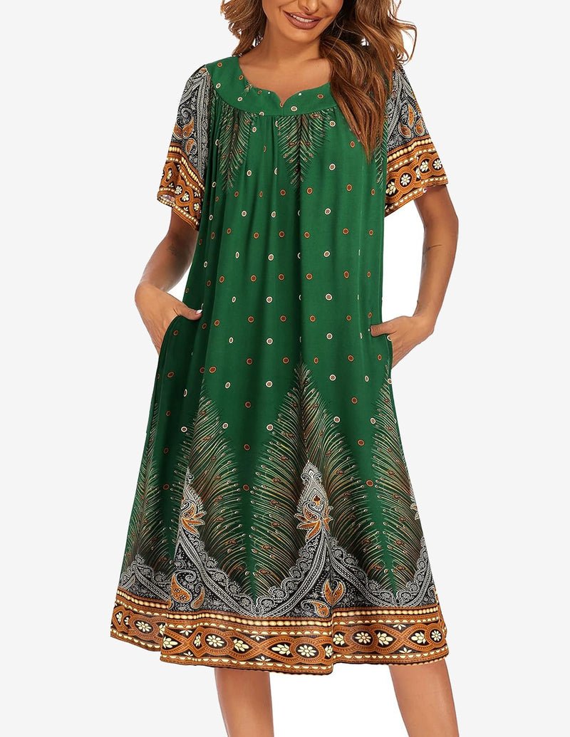 Green short-sleeve house dress with pockets, dotted print and ornate border hem
