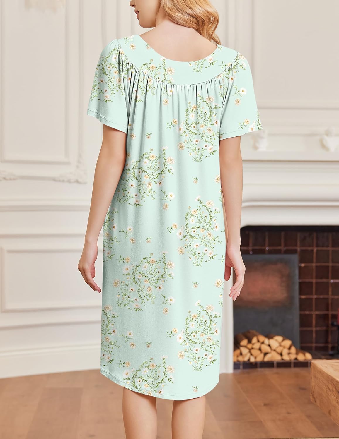 Back view of mint green floral short-sleeve house dress, gathered yoke