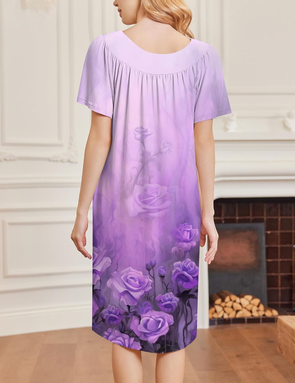 Purple floral short-sleeve house dress from back view, gathered yoke, midi length
