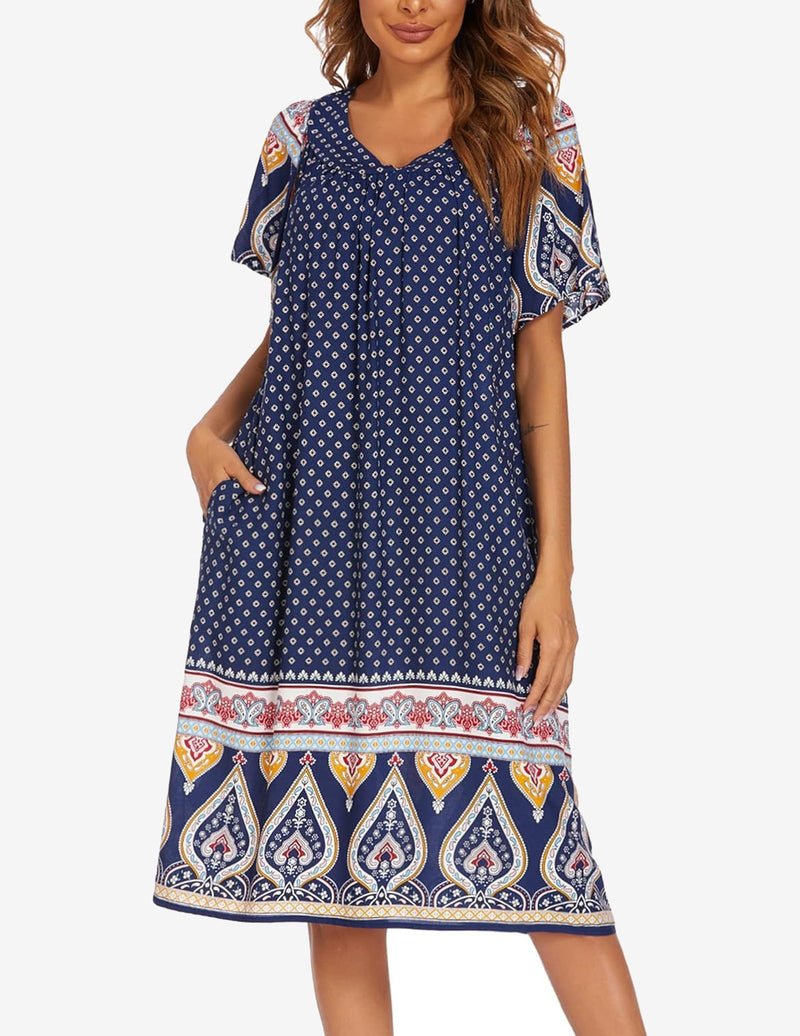 Dark blue short-sleeve house dress with pockets, small motif print and border hem