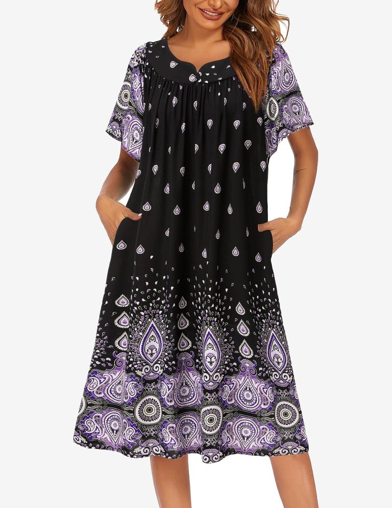 Black short-sleeve house dress with pockets, teardrop print and purple paisley hem