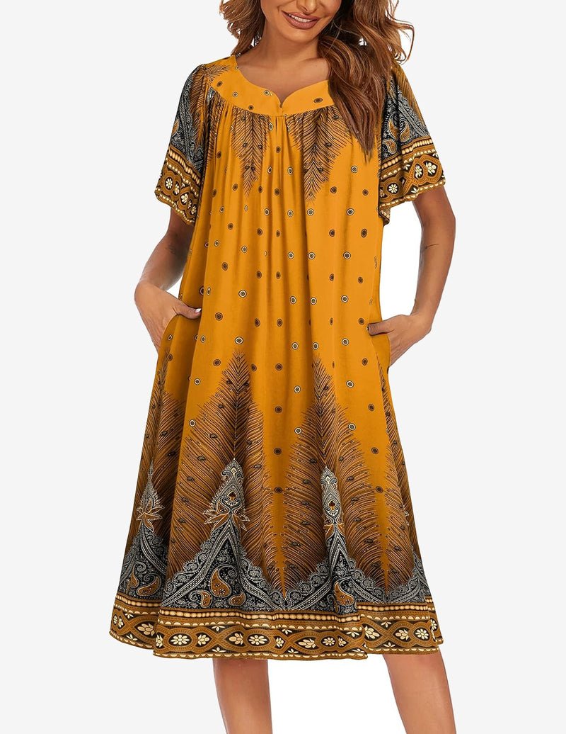 Mustard yellow short-sleeve house dress with pockets, paisley border and button placket