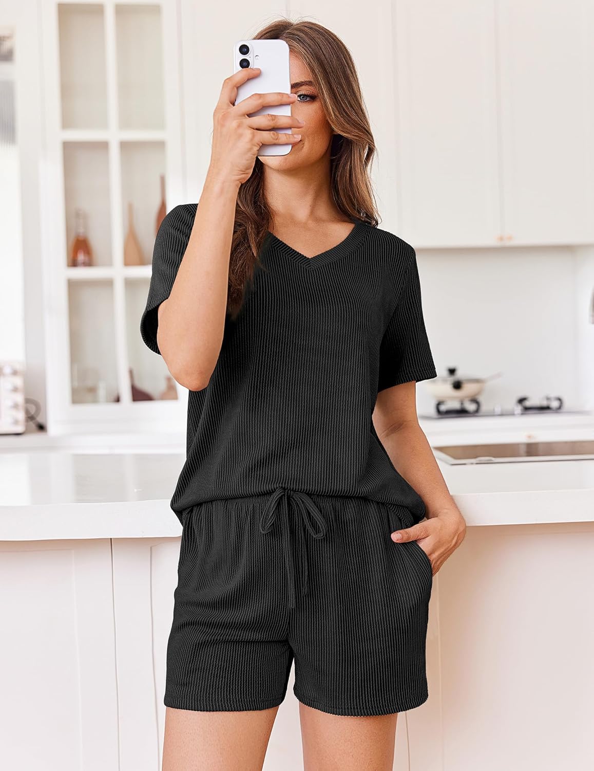 Black knit lounge set with V-neck short-sleeve top and drawstring shorts