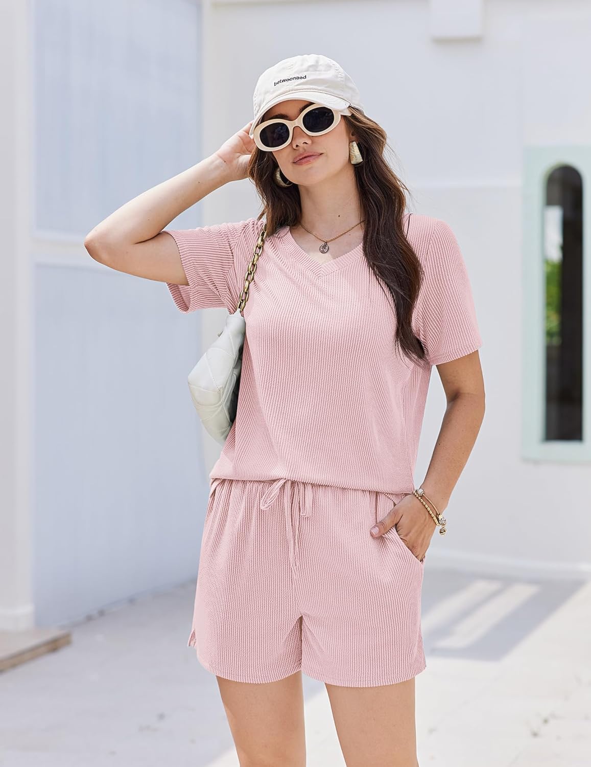 Light pink knit lounge set: V-neck short-sleeve top and drawstring shorts, 2-piece