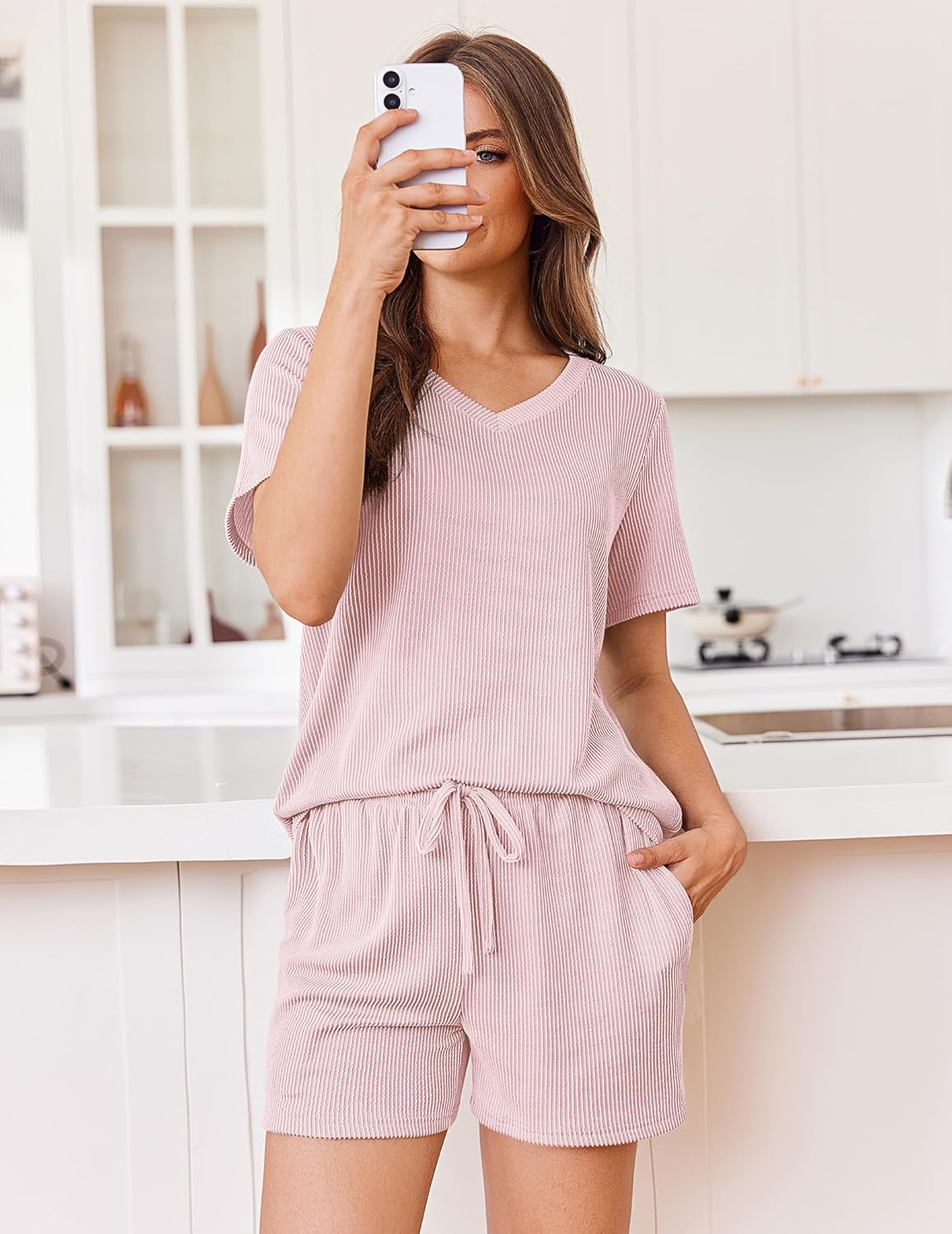 Light pink V-neck knit top with short sleeves and matching drawstring shorts, 2-piece