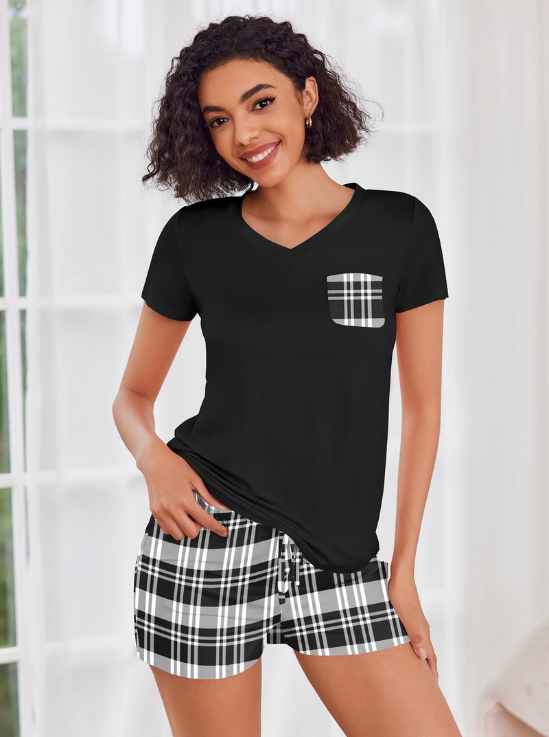 Black short-sleeve pajama set with plaid pocket and black-and-white plaid drawstring shorts