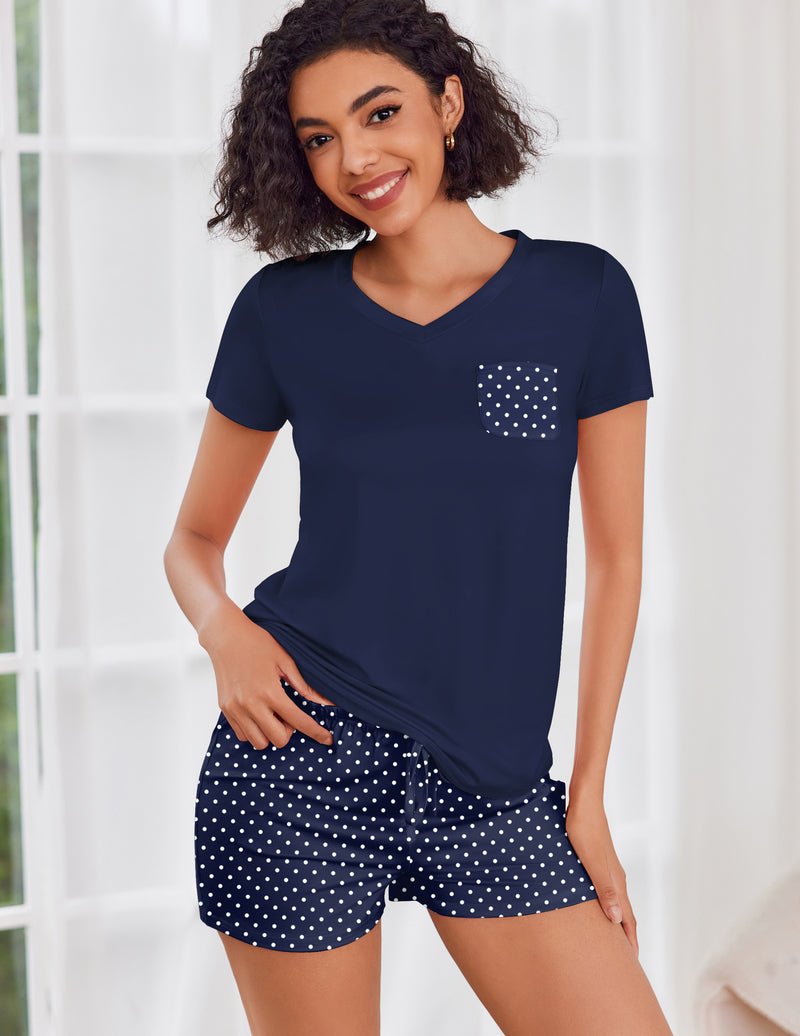 Conjunto pijama manga corta azul marino con lunares blancos y short a juego