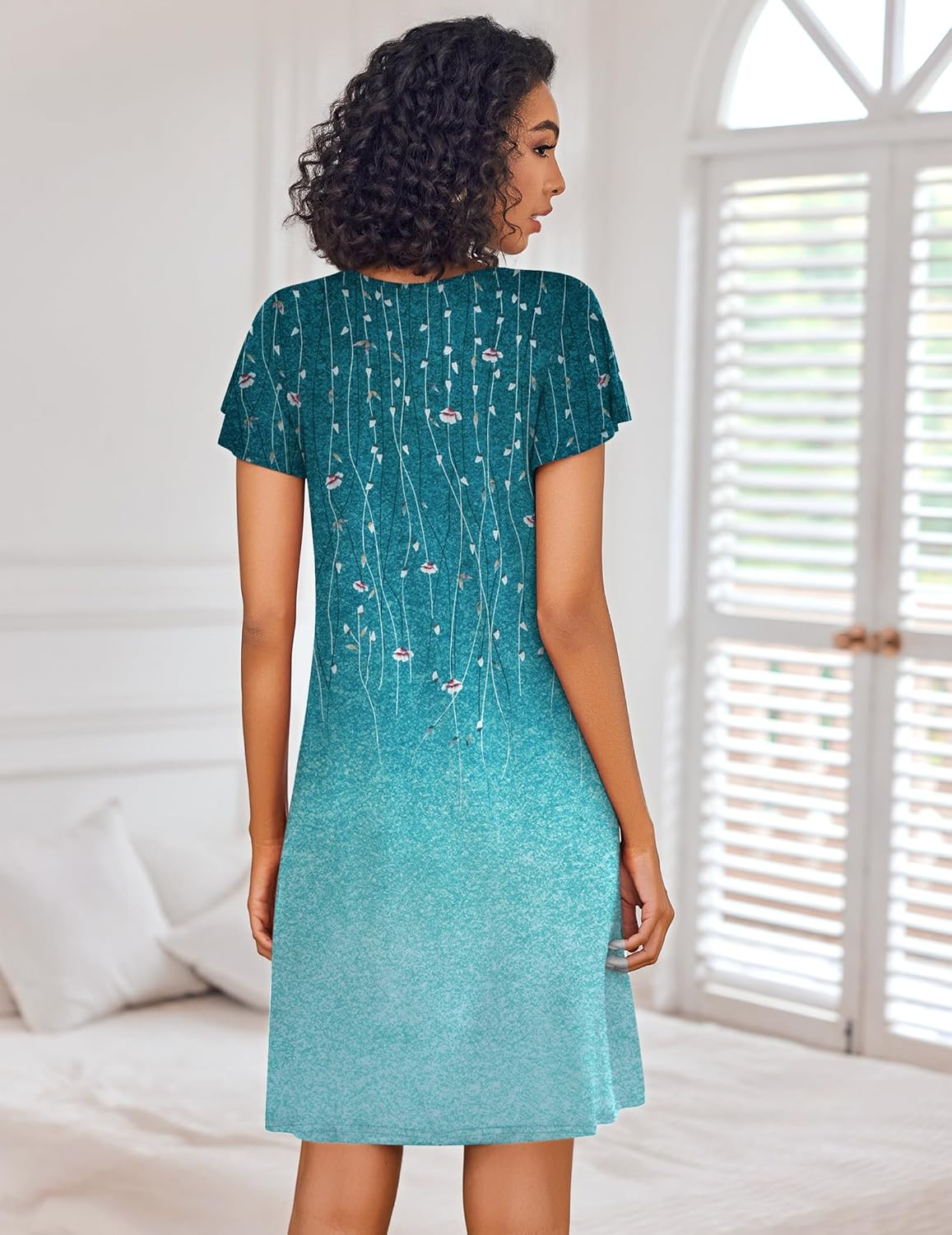 Teal floral night dress with short sleeves and V-neck, pleated yoke, back view