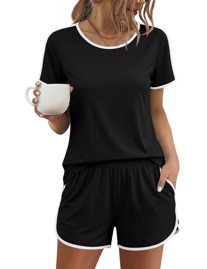 Black short-sleeve pajama set with white-trim crew neck and elastic-waist drawstring shorts