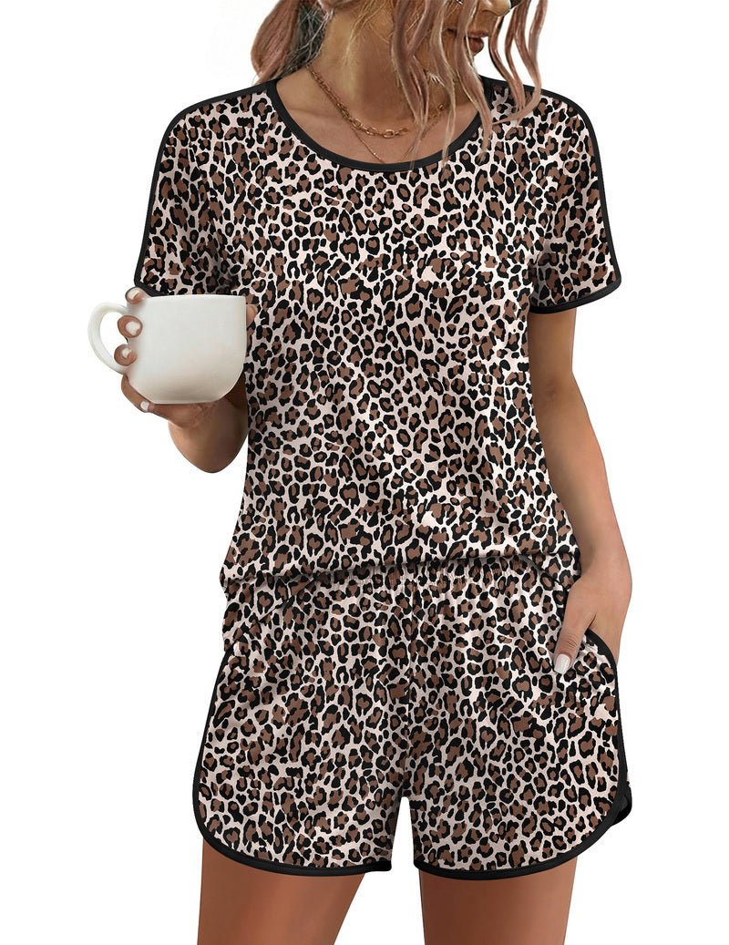 Black leopard-print short-sleeve pajama set with crew neck and matching drawstring shorts