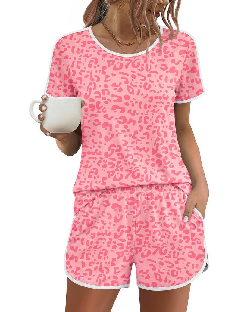 Pink leopard-print short-sleeve pajama set with crew neck and matching drawstring shorts