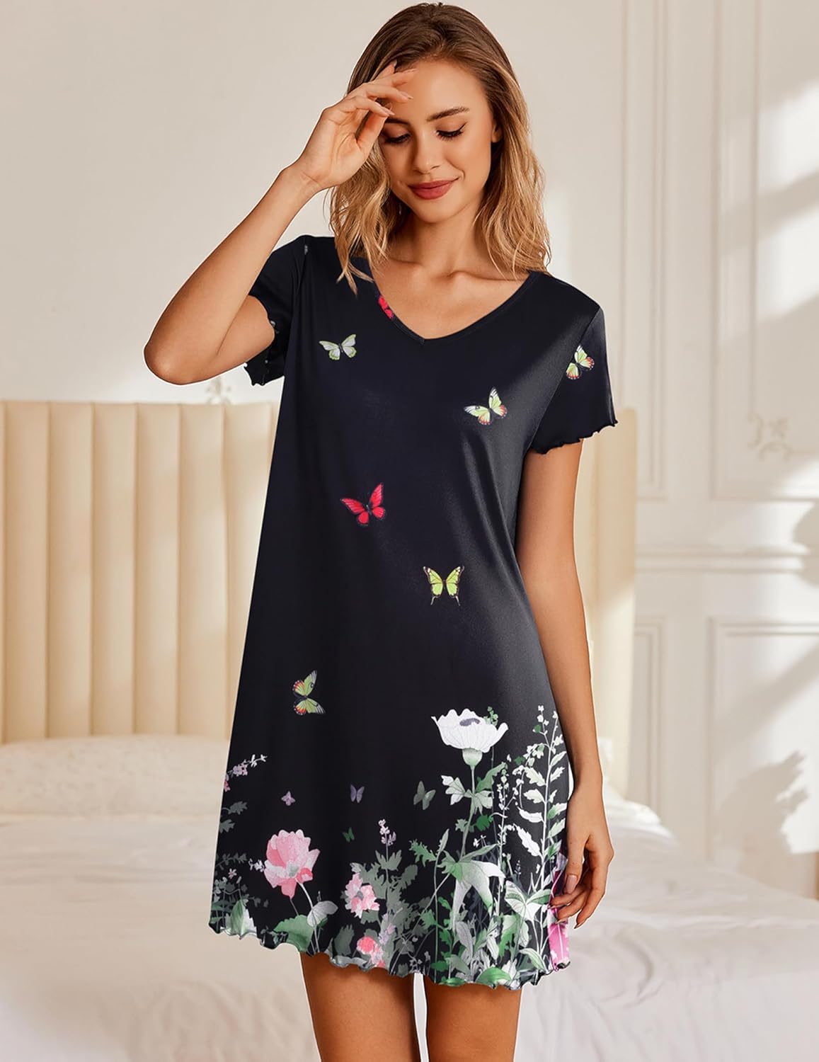 Black short nightshirt dress with colorful butterfly floral print, V-neck scalloped hem