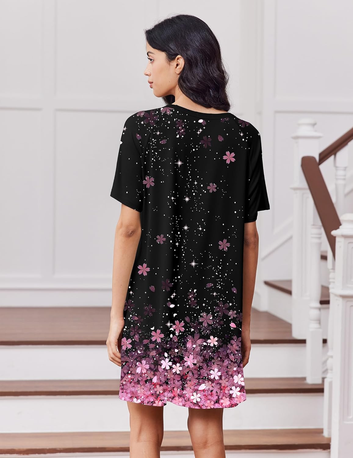 Black short-sleeve crewneck sleep shirt night dress with pink floral star print, back.