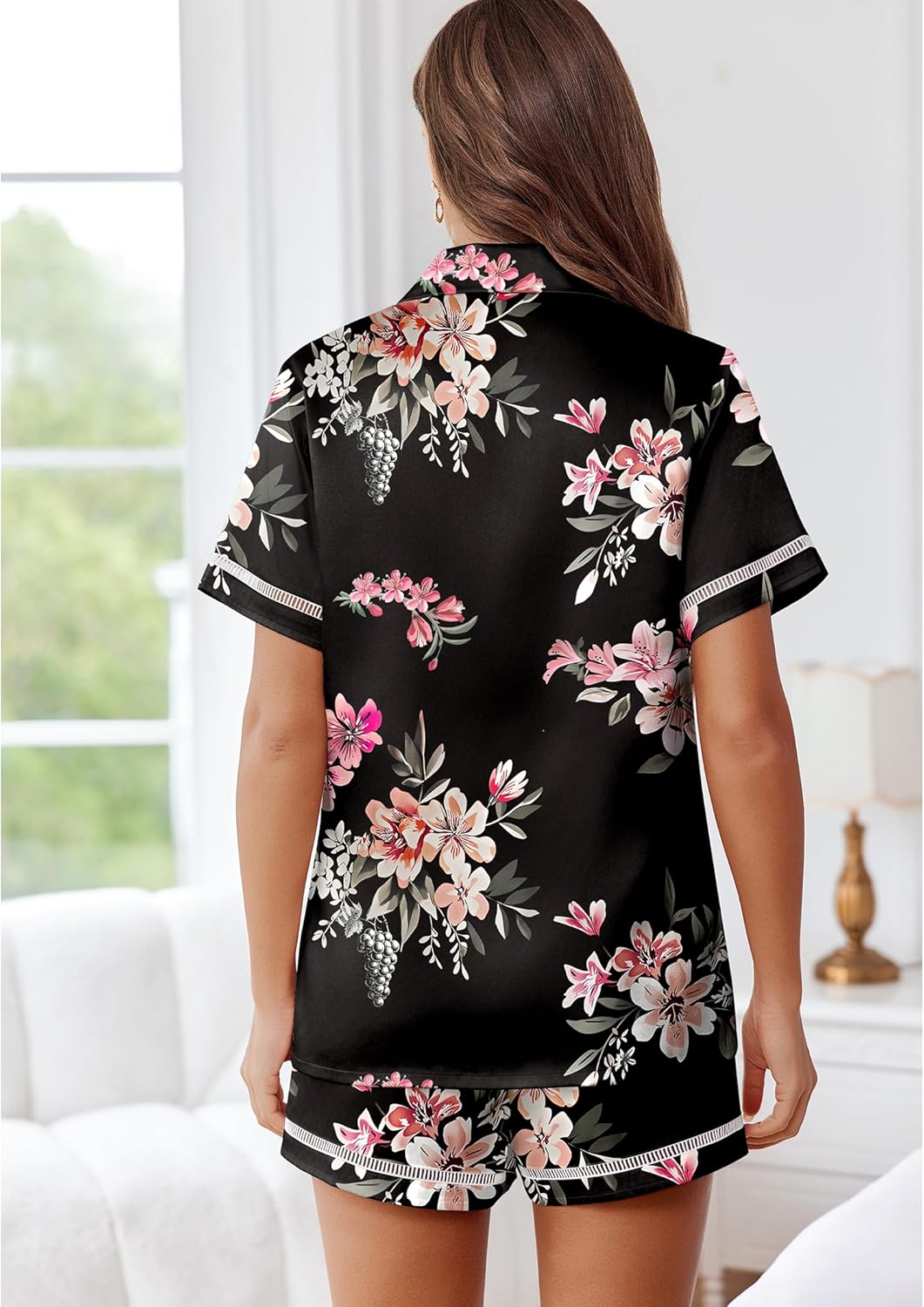 Back view black floral satin pajama set with button-up top and matching shorts