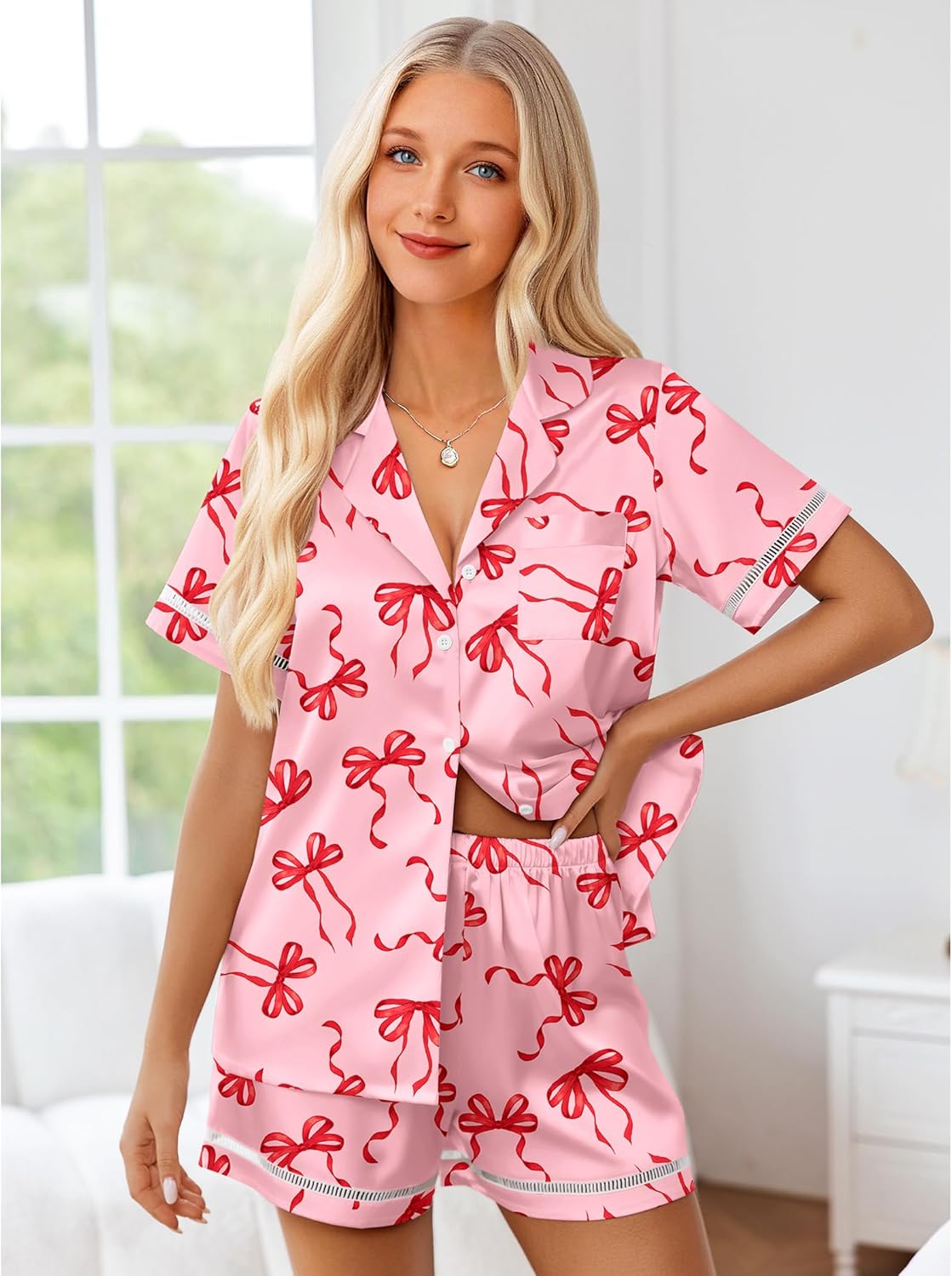 Pink bow print satin pajama set, short-sleeve button-up with matching elastic shorts