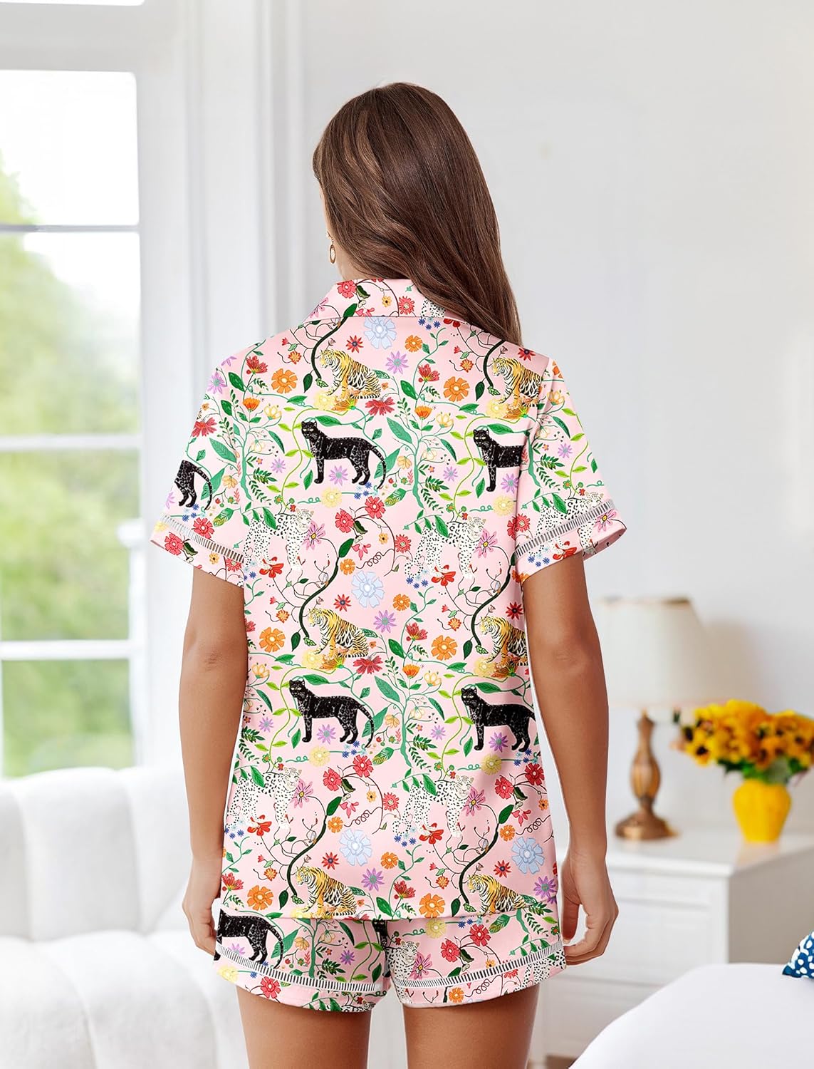Back view light animal print satin pajama set with button-up top and shorts