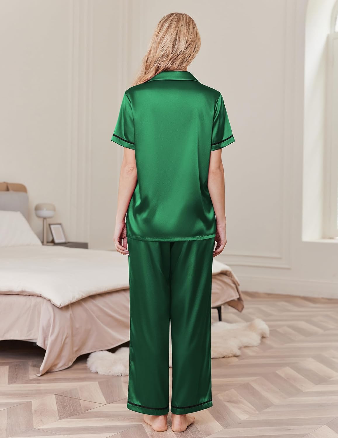 Green satin pajama set back view: short-sleeve top with stand collar, wide-leg pants