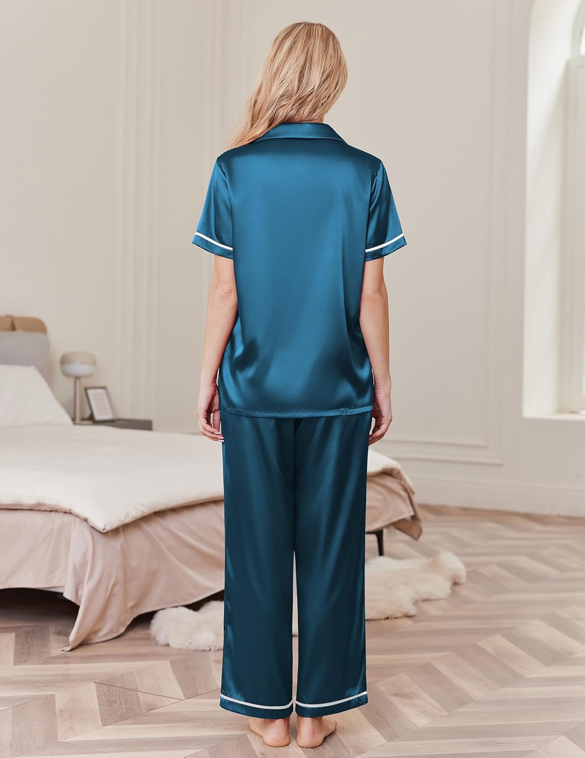 Teal silk pajama set with short sleeves, satin piping detail, wide-leg pants, back view