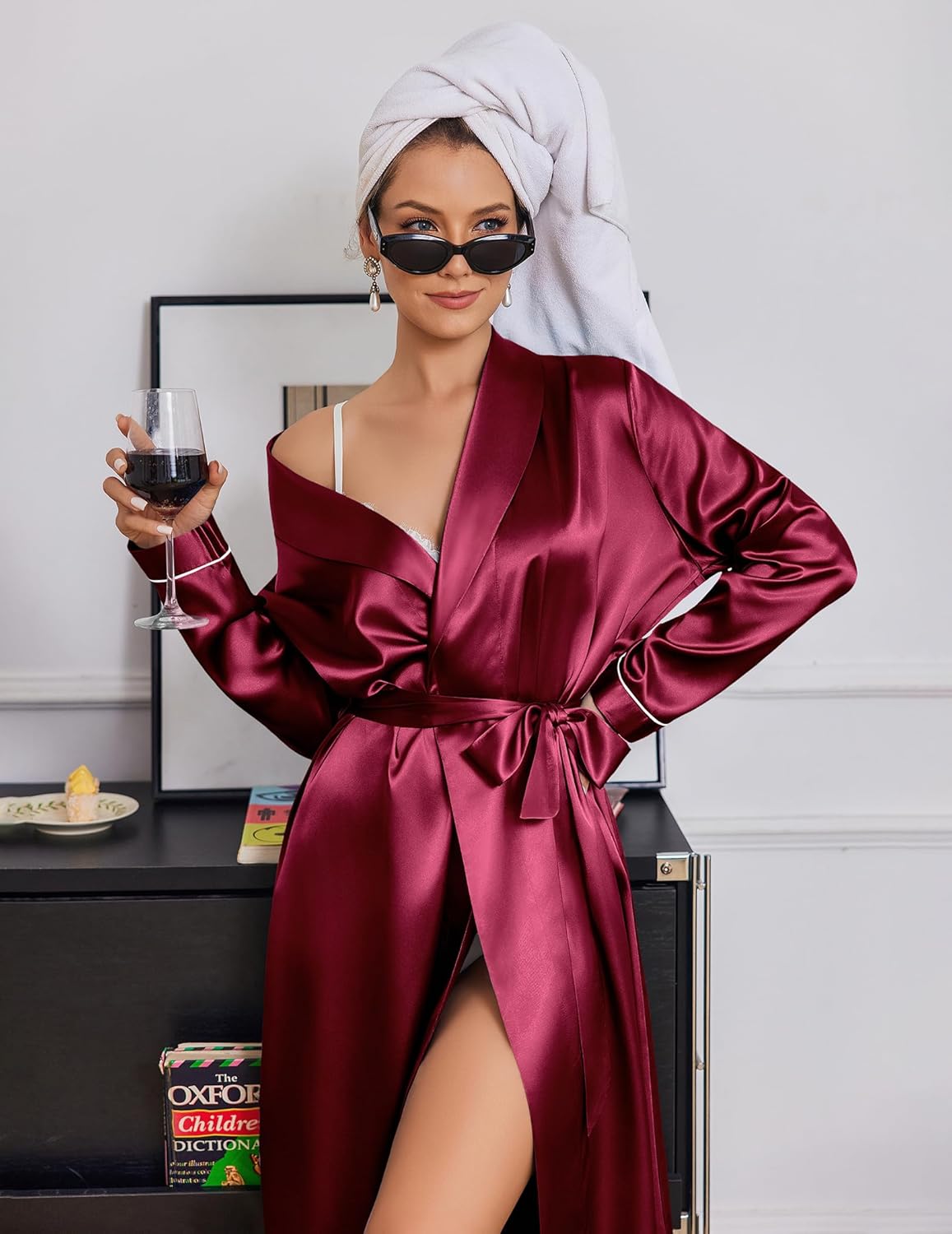 Deep purple satin robe with shawl collar, tie belt, long sleeves, side slit