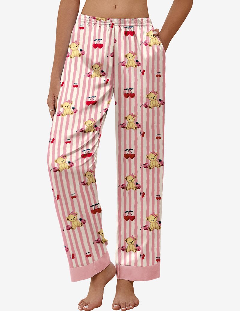 Pink striped pajama pants with teddy bear and bow print, elastic waist, cuffed hem