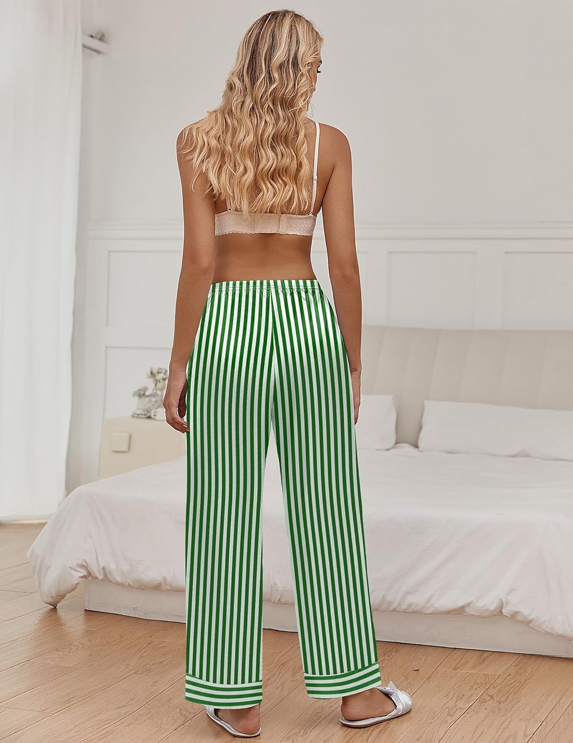 Silk satin pajama pants with green-and-white vertical stripes, elastic waist, wide-leg