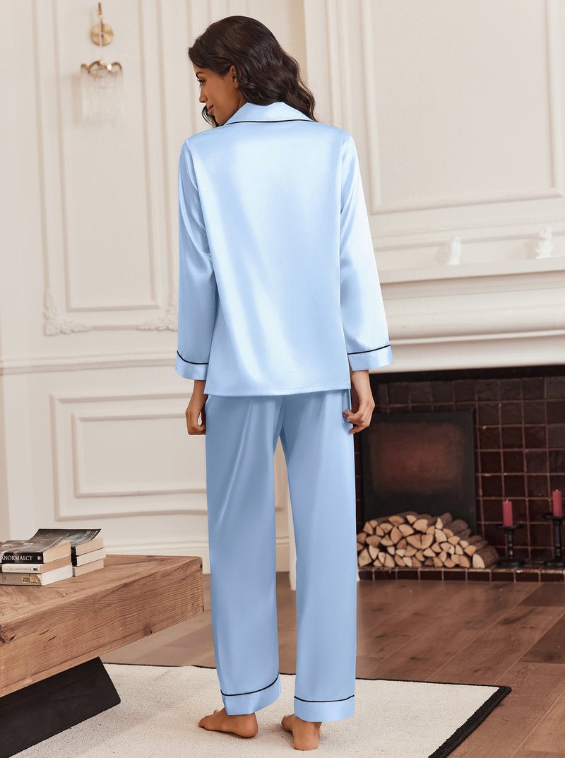 Light blue satin pajama set viewed from back, button-up top and long pants