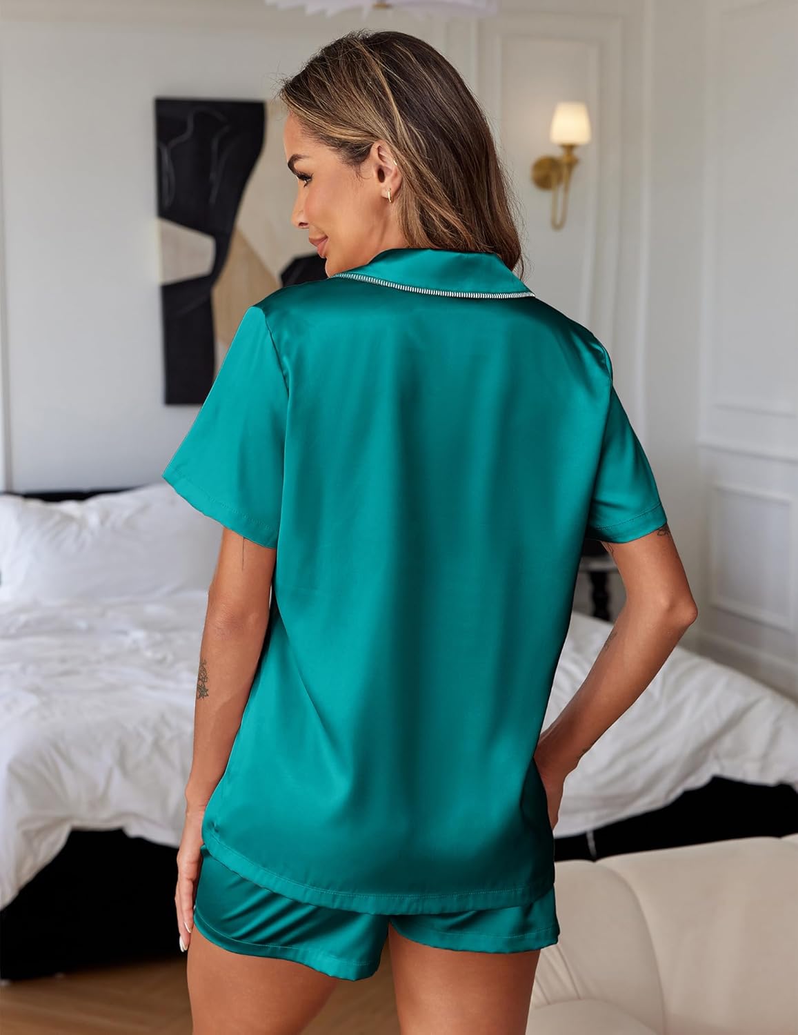 Teal satin pajama set, back view of short-sleeve top with matching drawstring shorts