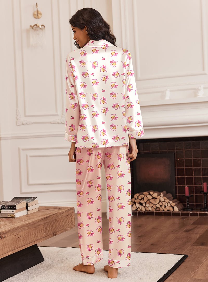 Silk satin pajama set in light pink teddy print, long-sleeve button shirt and straight pants