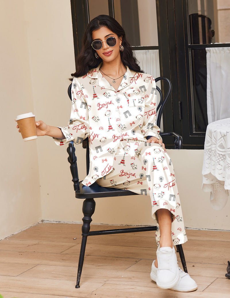 White silk satin teddy bear pajama set with long-sleeve button top and matching straight-leg pants