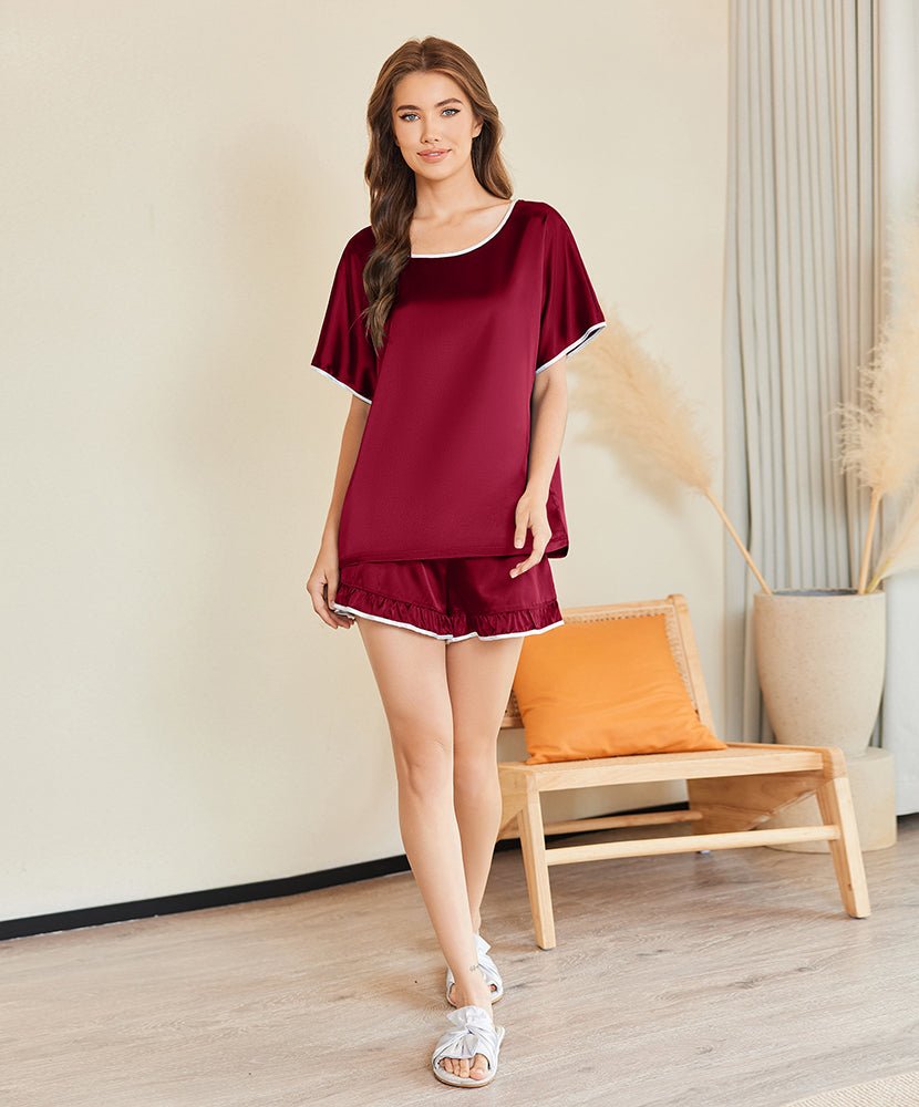 Silk sleepwear set with wine red satin top and ruffle shorts, short sleeves with contrast edge
