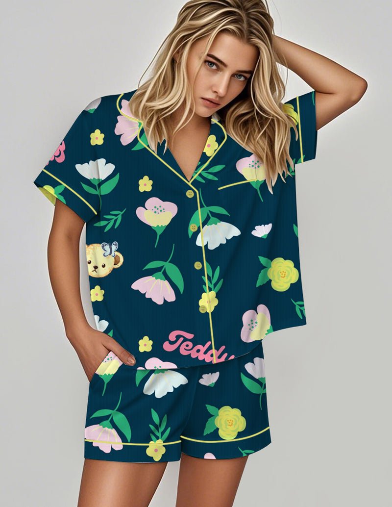 Silky pajama set with blue floral and bear print, short-sleeve top and matching shorts